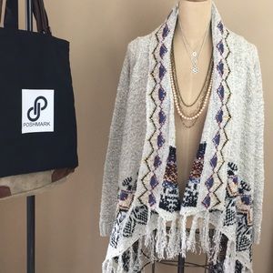 Eyeshadow fringe wrap cardigan sweater